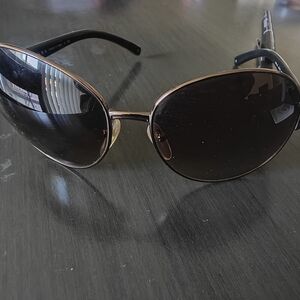 Elegant Gold and Black Sunglasses